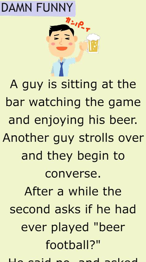 A guy is sitting at the bar watching the game